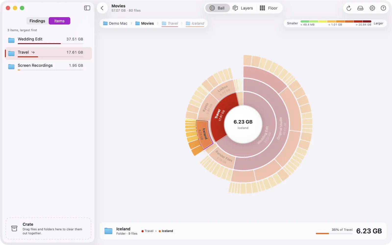 Ball view zoomed into Movies, 57.07 GB. The pointer rests on Iceland, a folder inside Travel: its path to the centre is lit in orange and red while everything else fades, and a card reads Iceland, 6.23 GB, 35% of Travel, 11% of Movies.